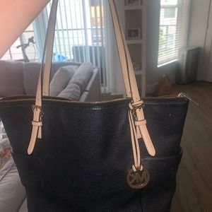 Jet set large leather black purse